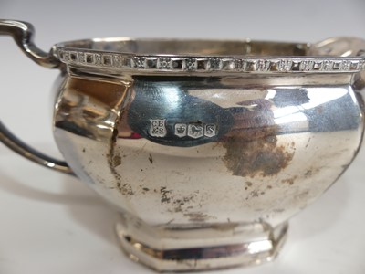 Lot 147 - An Art Deco style silver five-piece tea and...