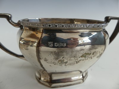 Lot 147 - An Art Deco style silver five-piece tea and...