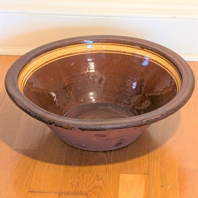 Lot 1042 - An earthenware pancheon, circa 1900, having a...