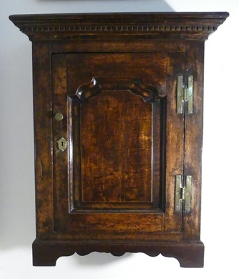 Lot 1293 - An antique joined oak single door table...