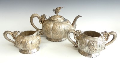 Lot 2447 - A late 19th century Chinese silver three-piece...