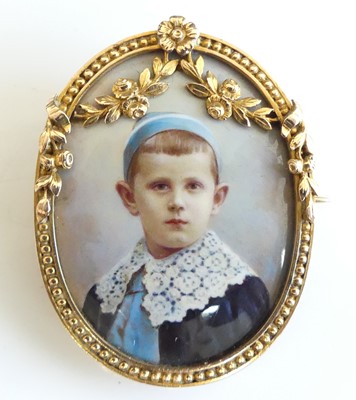 Lot 2600 - An Edwardian yellow metal miniature portrait...