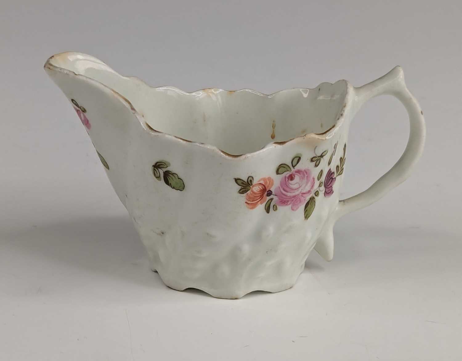 Lot 2034 - A Lowestoft porcelain cream jug, circa 1790,...