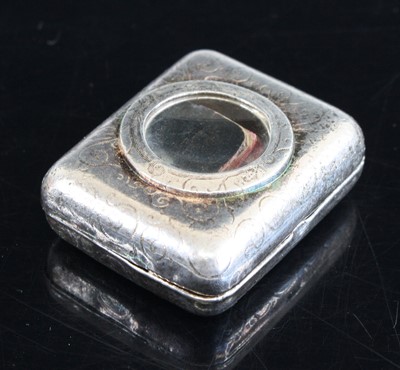 Lot 357 - A reproduction white metal pendant containing...