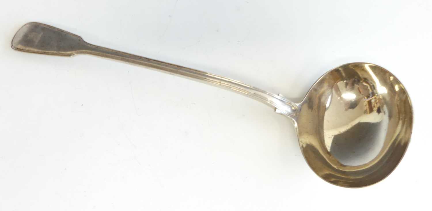 Lot 2102 - A Victorian silver soup ladle, in the Fiddle &...