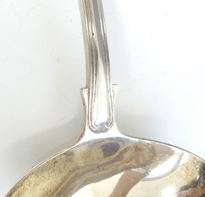 Lot 2102 - A Victorian silver soup ladle, in the Fiddle &...