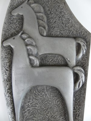Lot 181 - A Modernist silvered composite shaped wall...