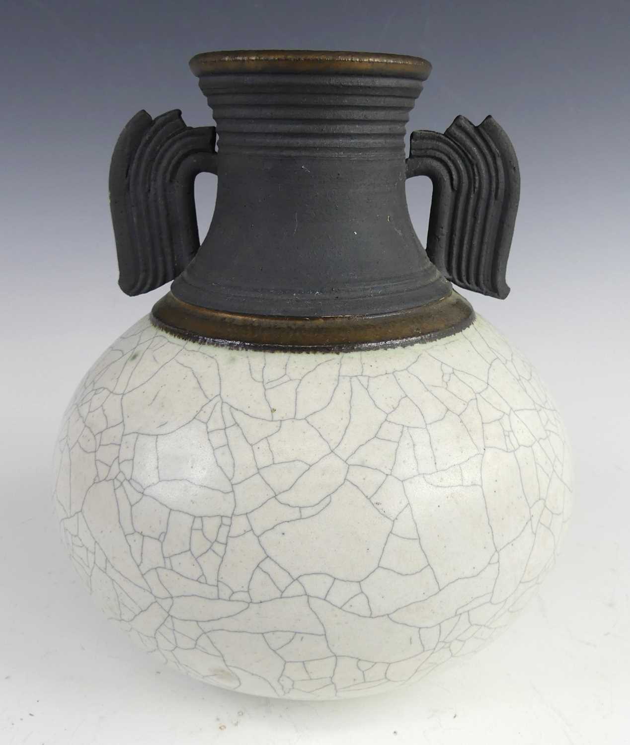 Lot 57 - A contemporary twin handled studio pottery...