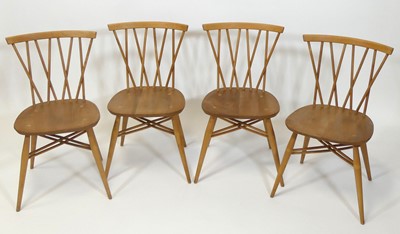 Lot 412 - A set of four 1960s Ercol light elm...