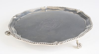 Lot 2186 - A George III silver card waiter, having a...