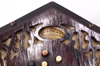 Lot 688 - A late Victorian Concertina of typical...