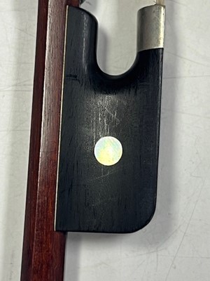 Lot 666 - A viola bow, the round Pernambuco stick with...