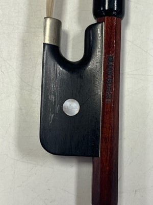 Lot 666 - A viola bow, the round Pernambuco stick with...