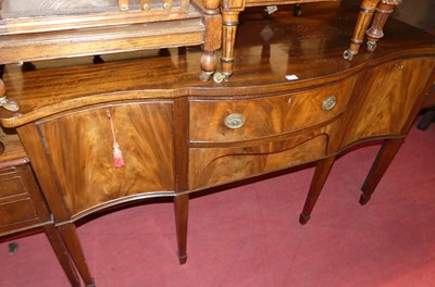 Lot 1388 - An early 20th century mahogany serpentine...