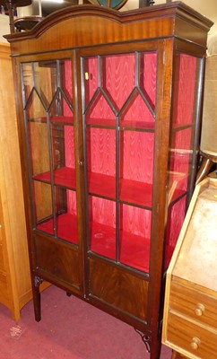 Lot 1193 - An Edwardian mahogany double door glazed china...