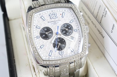 Lot 425 - A gent's Diamond & Co steel cased quartz...