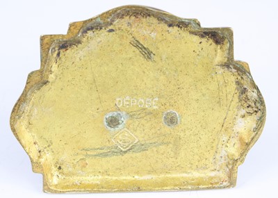 Lot 603 - A post WW I brass desk weight in the form of...