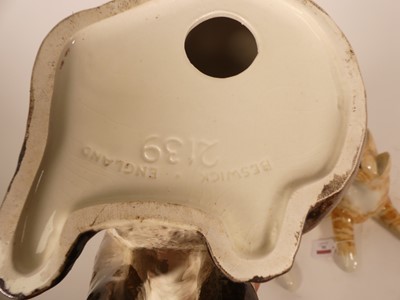 Lot 30 - A Beswick pottery figure of a Siamese cat,...