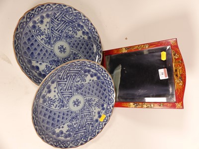 Lot 38 - A red lacquered chinoiserie decorated easel...