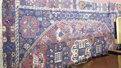 Lot 1162 - A Persian woollen blue ground Tabriz rug, 210...