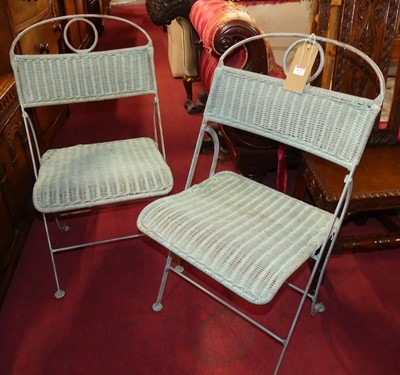 Lot 1337 - A pair of contemporary wrought metal and...