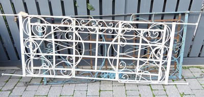 Lot 1409 - Two early 20th century painted wrought iron...