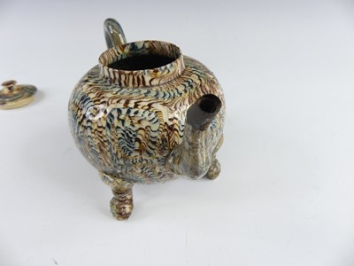 Lot 2069 - A Staffordshire agateware teapot, circa 1755,...