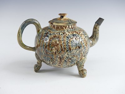 Lot 2069 - A Staffordshire agateware teapot, circa 1755,...