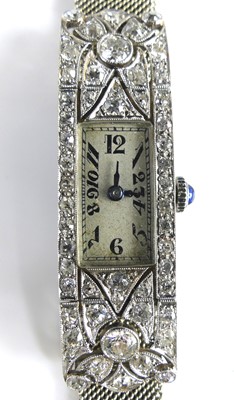 Lot 2696 - An Art Deco white metal and diamond manual...