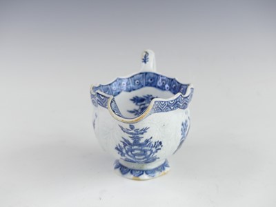 Lot 2056 - A Bow blue and white porcelain sauce boat,...