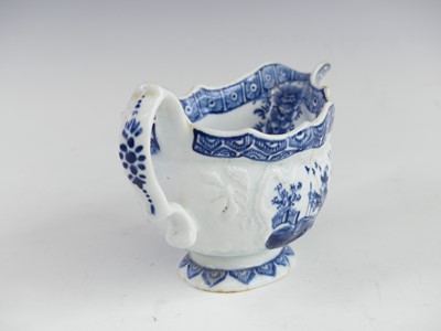 Lot 2056 - A Bow blue and white porcelain sauce boat,...