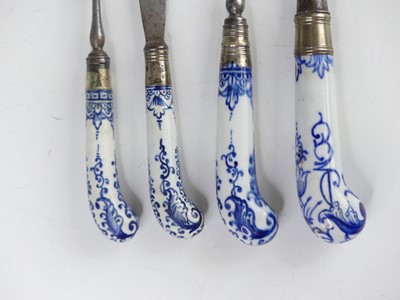 Lot 2082 - Four Bow blue and white porcelain handled...