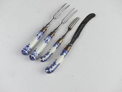 Lot 2086 - Three St Cloud blue and white porcelain forks...