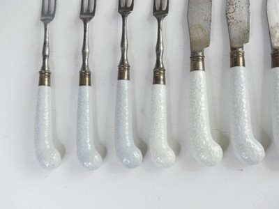 Lot 2083 - Seven Worcester porcelain-handled knives and...