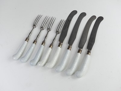 Lot 2083 - Seven Worcester porcelain-handled knives and...