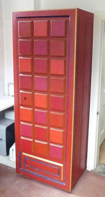 Lot 1279 - A contemporary red painted wardrobe, having a...