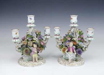 Lot 2093 - A pair of Meissen porcelain three-branch table...
