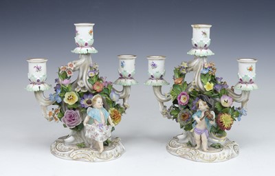 Lot 2093 - A pair of Meissen porcelain three-branch table...