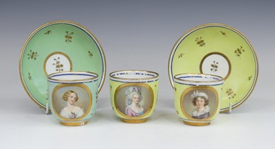 Lot 2098 - A set of three Vienna porcelain tea cups and...
