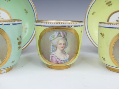Lot 2098 - A set of three Vienna porcelain tea cups and...