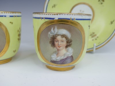Lot 2098 - A set of three Vienna porcelain tea cups and...