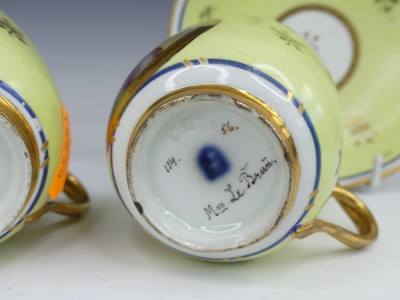 Lot 2098 - A set of three Vienna porcelain tea cups and...