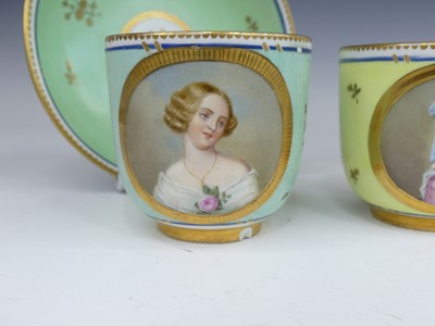Lot 2098 - A set of three Vienna porcelain tea cups and...