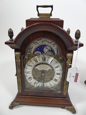 Lot 7 - An Art Deco oak cased mantel clock, having an...