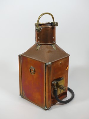 Lot 9 - A 19th century copper and brass ship's lamp, h....