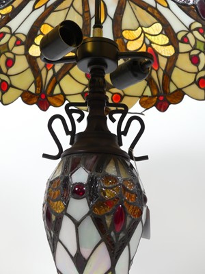 Lot 15 - A Tiffany style table lamp, having a stained...