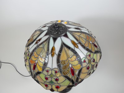 Lot 15 - A Tiffany style table lamp, having a stained...