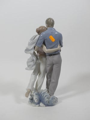 Lot 22 - A Lladro porcelain figure group of a courting...