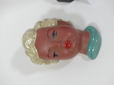 Lot 31 - An Art Deco style plaster figure of a lady,...