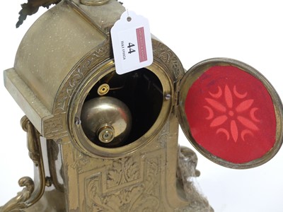Lot 44 - A 20th century brass mantel clock, the...